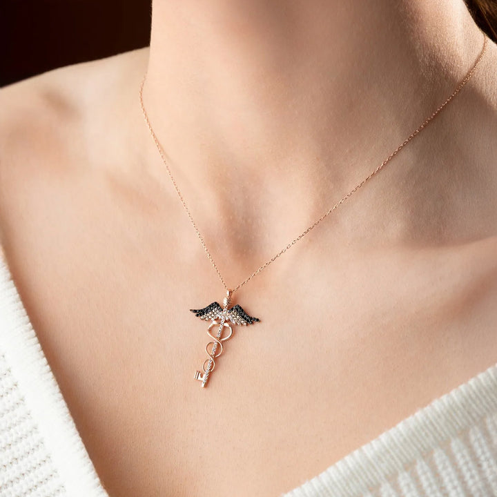 Necklace with the Caduceus pendant worn by a person