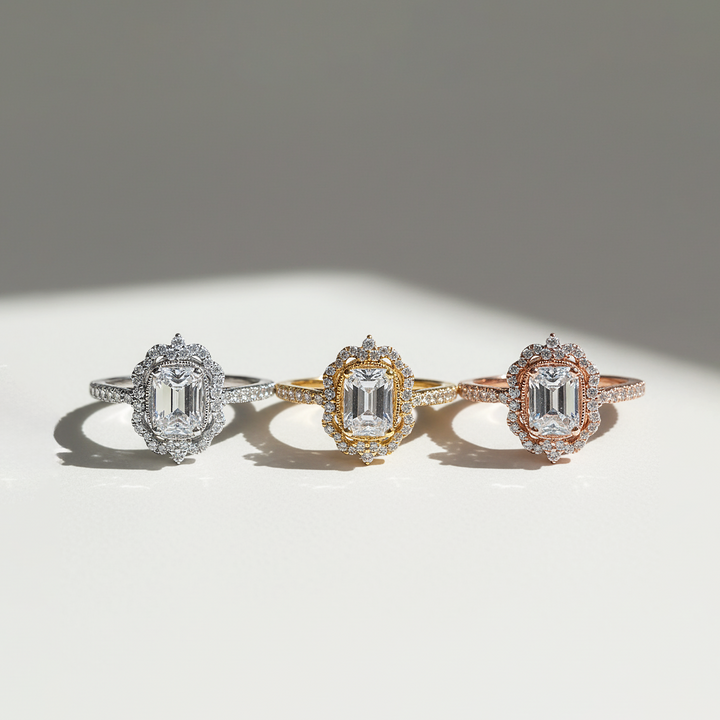 Three diamond rings with different colored bandings on a light background