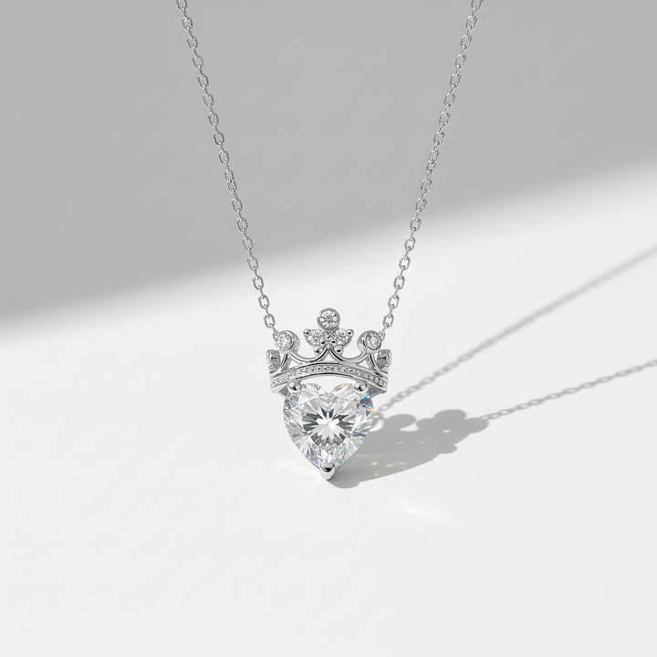 Diamond necklace with a crown-like design on a light gray background