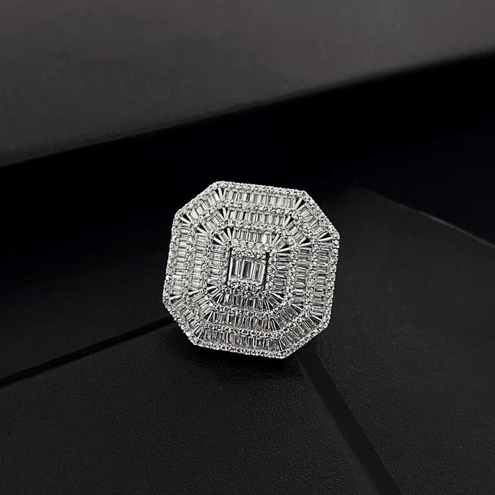 Diamond ring with a geometric design on a black background