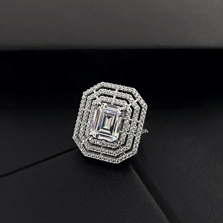 Diamond ring with a geometric design on a black background