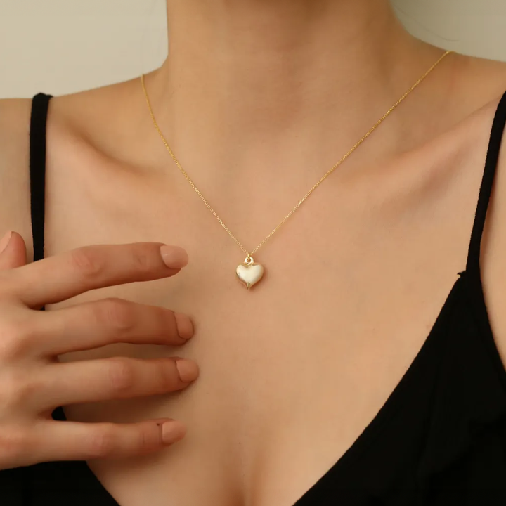 gold puffed heart necklace