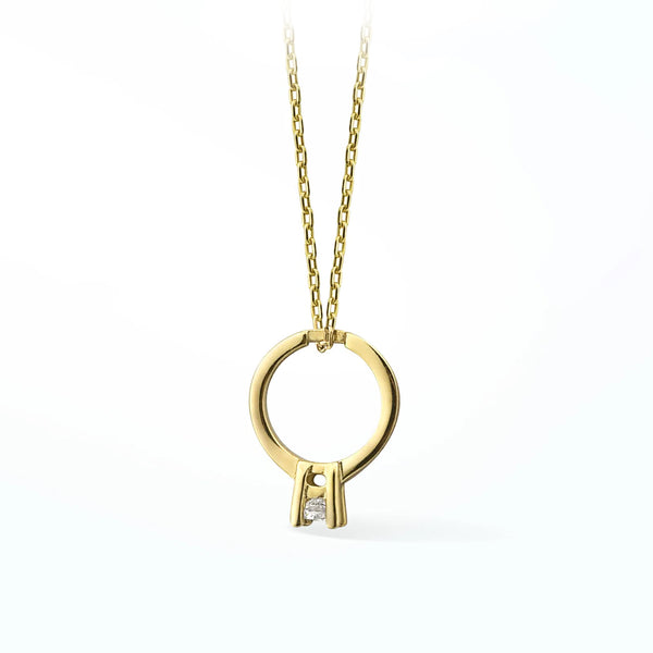 Gold necklace with a unique pendant on a white background